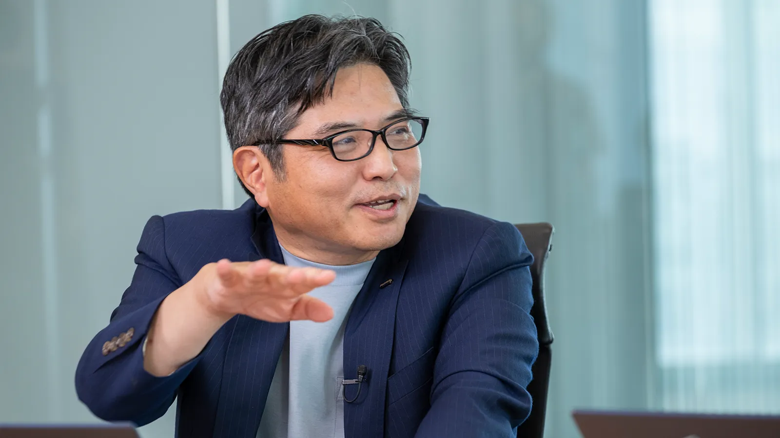質問に答える笑顔の福永さん
